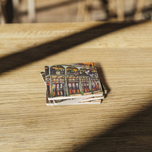 Load image into Gallery viewer, Antoines_Restaurant_SquareStoneCoaster_WoodTable_AS_Mockup.png_16188030