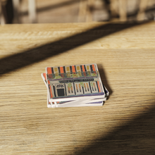 Load image into Gallery viewer, Court_of_Two_Sisters_Stone_Coaster_Set_o_SquareStoneCoaster_WoodTable_AS_Mockup.png_16078365